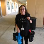 Lady wearing black Jamaica shirt