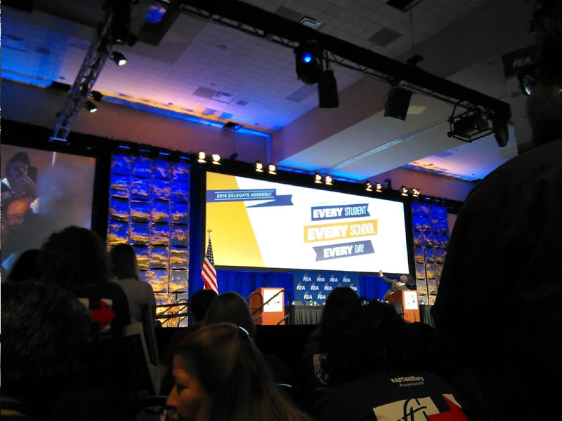 Delegate Assembly banner on large screen