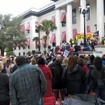 Large crowd of people at enough is enough rally