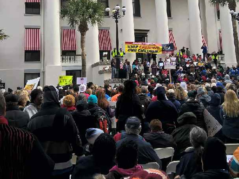 Large crowd of people rallying