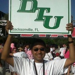 Man holding dtu banner over head