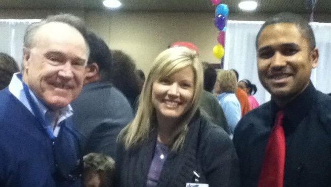John meets, blonde haired lady and an elderly gentleman