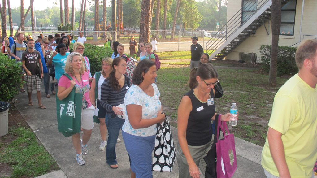 People lining up for school supplies