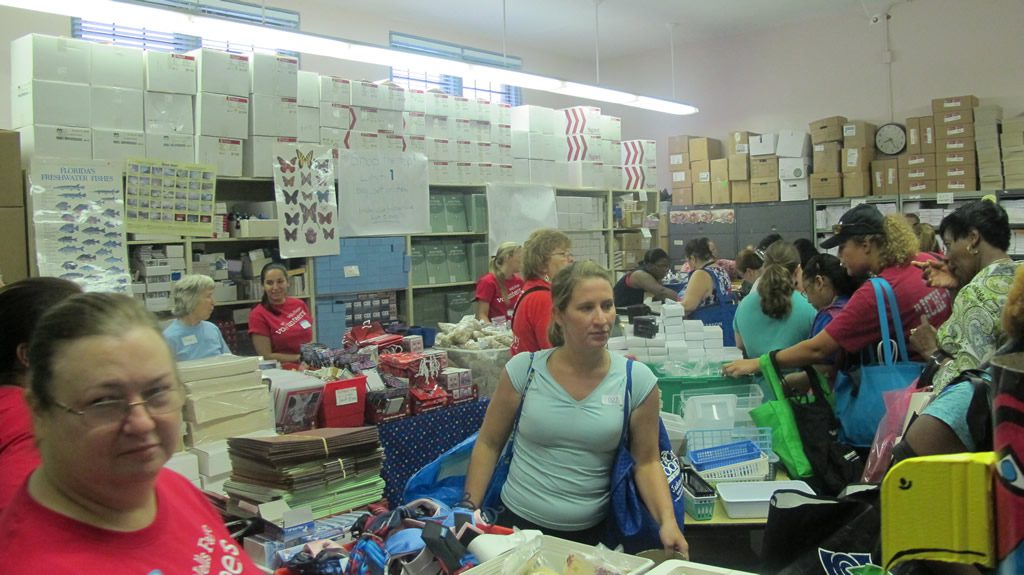 Room full of people and school supplies