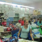 Room full of people and school supplies